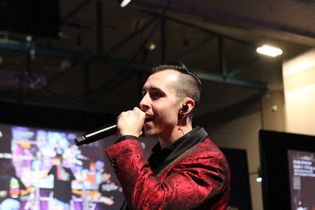 AURA DJ announcing an event